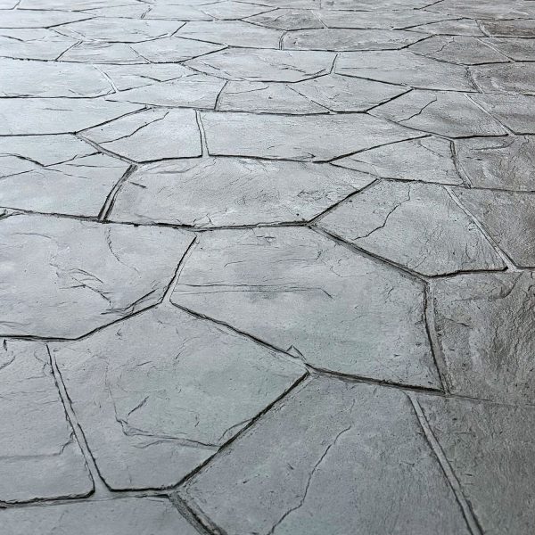Närbild på mönsterbetong i flagstone-mönster